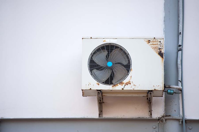 3 Telltale Signs It’s Time, Air Conditioning Equipment outside of an Hold House
