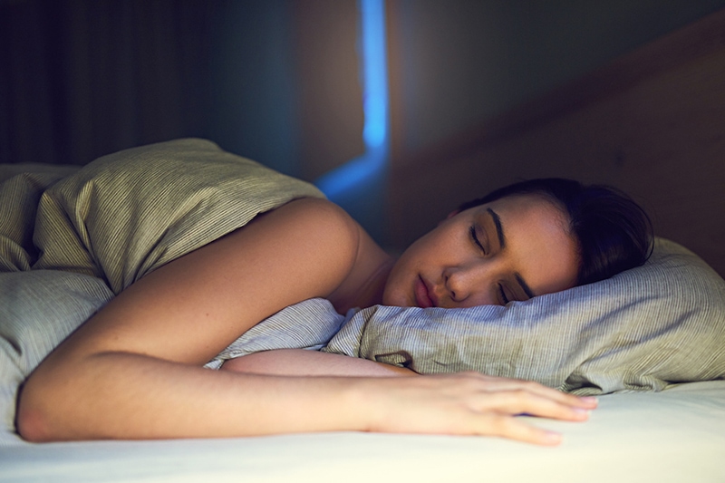 Blog Title: 3 Health Benefits for Using Your AC While Sleeping Photo: Getting a good night's sleep