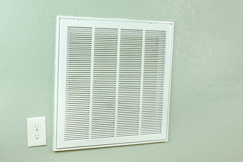 Home air conditioner and heating air filter intake vent on wall that leads to the handler. What You Should Know About Air Handlers